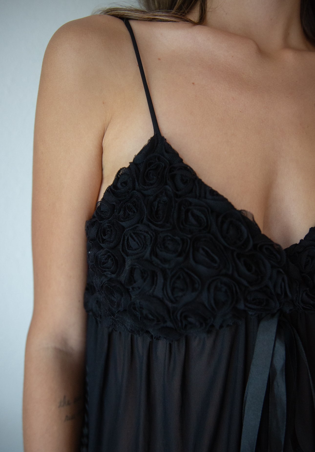 Rosette detail black mesh babydoll dress